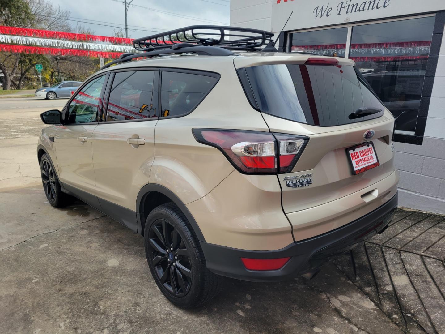 2018 Gold Ford Escape (1FMCU9GD5JU) with an 1.5L I4 F DOHC 16V engine, Automatic transmission, located at 503 West Court, Seguin, TX, 78155, (830) 379-3373, 29.568621, -97.969803 - 2018 Ford Escape SE 4WD with a 1.5L I4 F DOHC 16V, Automatic, Tilt, Cruise, AM/FM/CD Touchscreen Stereo, Power Windows, Locks, Seat and Side Mirrors, Bluetooth, Navigation, Automatic Headlights, Dual Climate Control, Rear A/C, Heated Seats, Tinted Windows, Luggage Rack, Backup Camera, Bumper Sensors - Photo#3